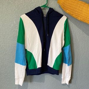 Pink brand color block zip up hoodie.